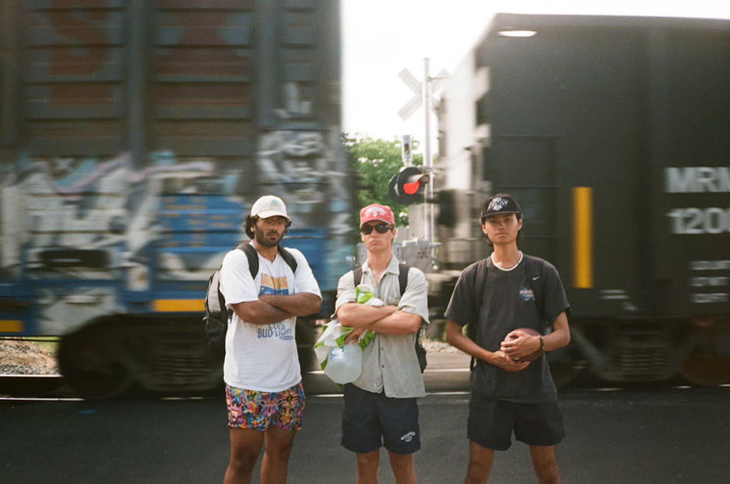 Picture two friends and I in front of a train